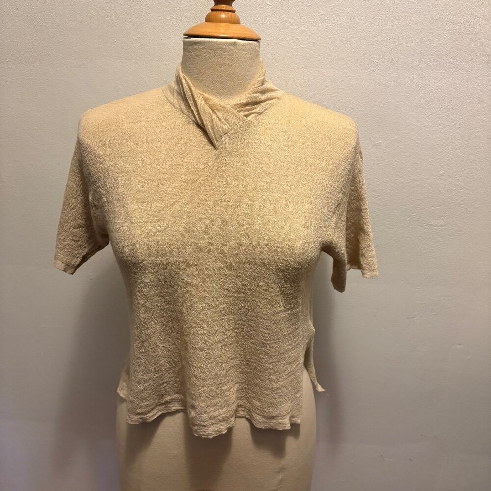 Creatures of Comfort short sleeve twisted V-neck sweater in beige wool crepe